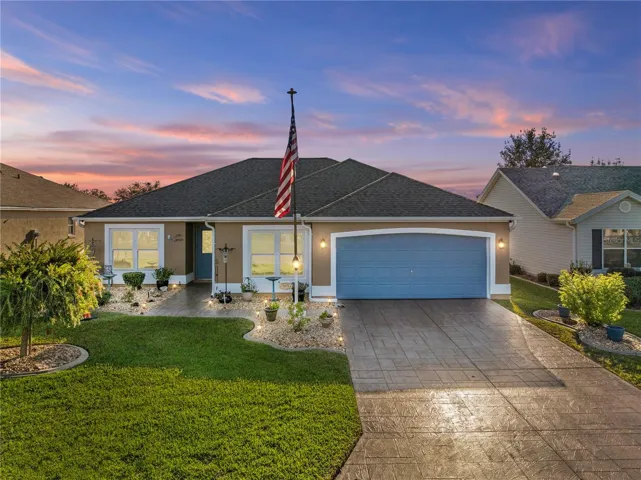 Welcome Home! Be sure to check out the custom concrete stamped, SUPER SIZED driveway, low maintenance flower beds with rock, lush / mature trees...This home has it all!!