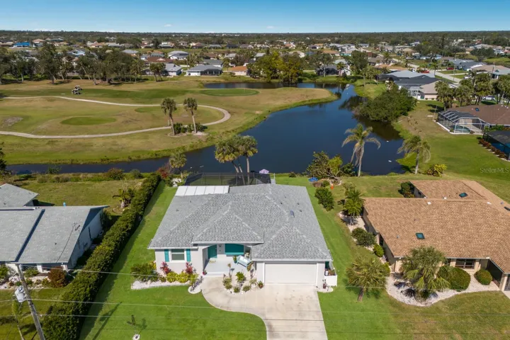 Your new home with lake AND golf course views.