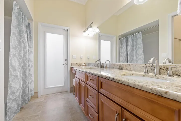 Guest bath #2 with access to pool area