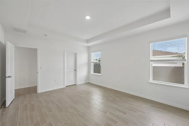 Primary Bedroom with Tray Ceiling