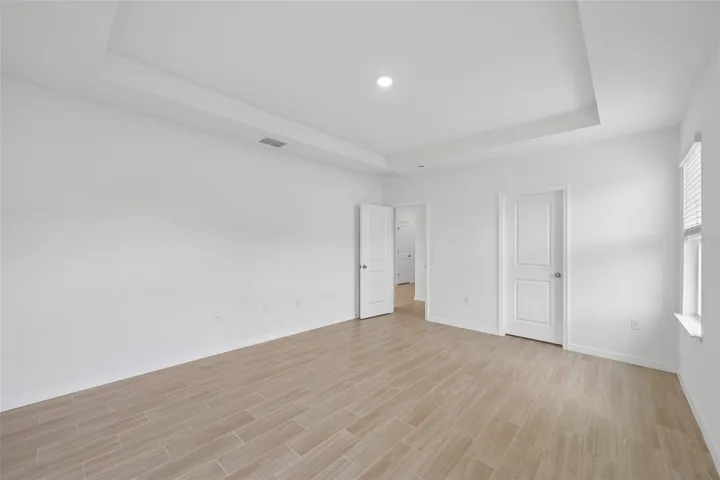 Primary Bedroom with Tray Ceiling