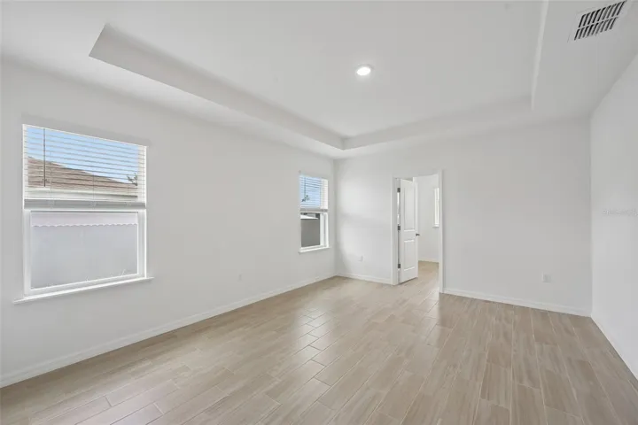 Primary Bedroom with Tray Ceiling