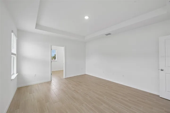 Primary Bedroom with Tray Ceiling