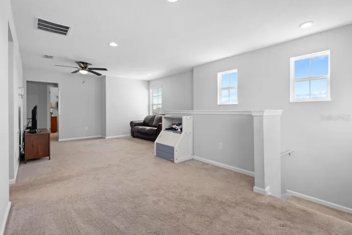 2nd floor loft for additional space for entertaining, 2nd living room or family room.