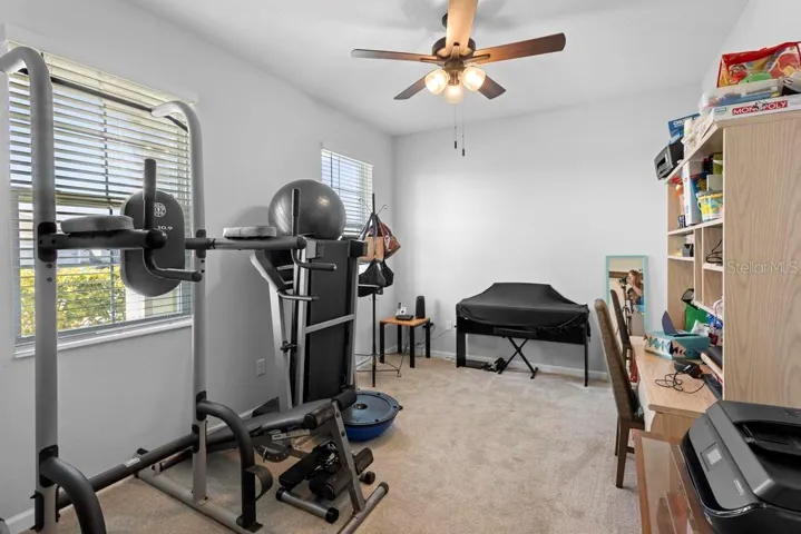 first floor large  bedroom (2) being utilized  as a home gym.