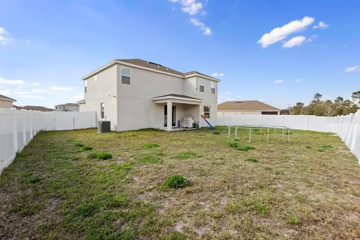 Large fenced in backyard.