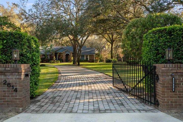 Double gate on side of property