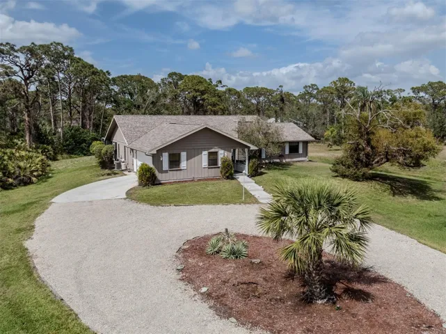 This private home in Englewood is on an acre plus a quarter of land.  Not located in an HOA, enjoy outdoor recreation areas, with plenty of room for additional car/truck parking, boats, and RV.