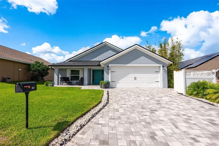 Welcome to Davenport’s Florida Pines community and this updated 4-bedroom, 3-full bath POOL HOME with an OWNED WHOLE HOME SOLAR SYSTEM (w/ battery backup!) to keep energy costs low, a NEW ROOF (2022), NEW TRIPLE PANED HURRICANE IMPACT WINDOWS (2022), NEW A/C (2021), and a NEW 40 GALLON ELECTRIC WATER HEATER (2021)!