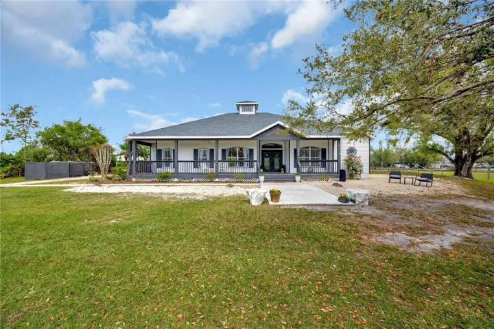 5 acre estate with updated farmhouse built in 2001 located at 7901 Hawkins Dr Sarasota Fl