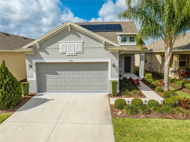 Located in the desirable 55+ community of Harmony, FL, this beautifully maintained home features solar panels, manicured landscaping, and a two-car garage.