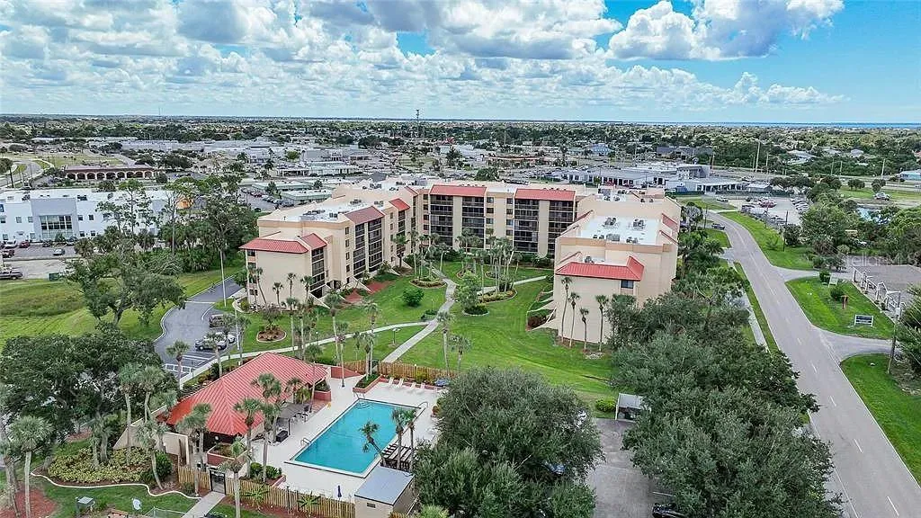 Aerial_3006CaringWay_PortCharlotte_CommunityPool_Overhead.jpg