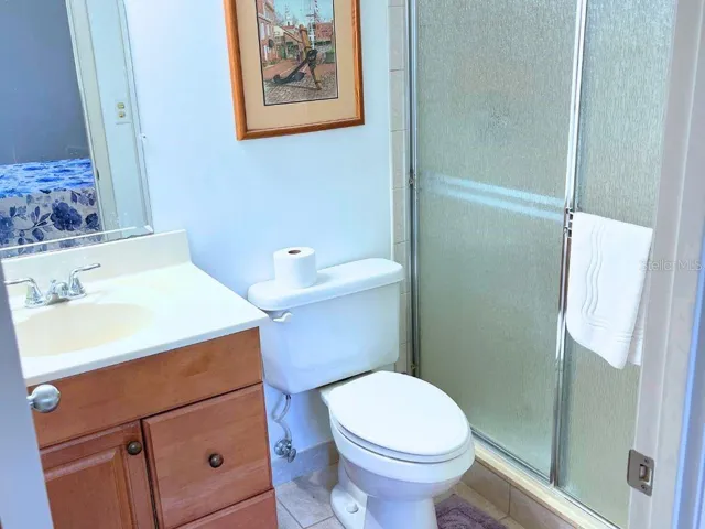 Bathroom2_3006CaringWay_PortCharlotte_ShowerEnclosure.jpg