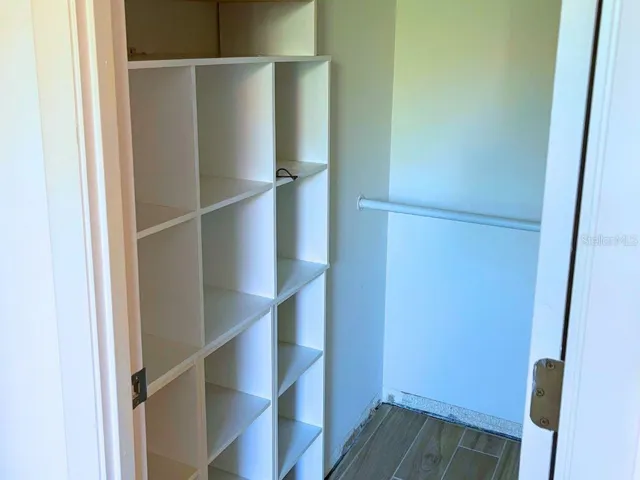 WalkInCloset_3006CaringWay_PortCharlotte_BuiltInShelving.jpg