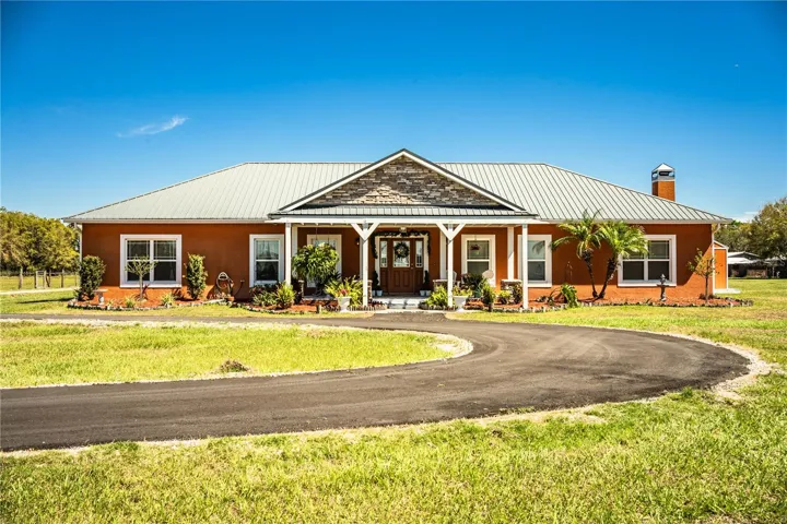 Front exterior with circular drive