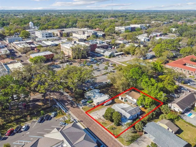 100 N. Main Street - features two detached buildings used as multi-tenant rentals. .25 acre lot zoned R-2.