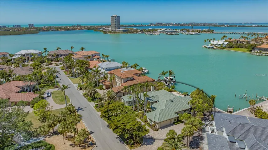 Welcome to Bird Key.  This Bayfront home has stunning views of the water and magnificent sunsets.