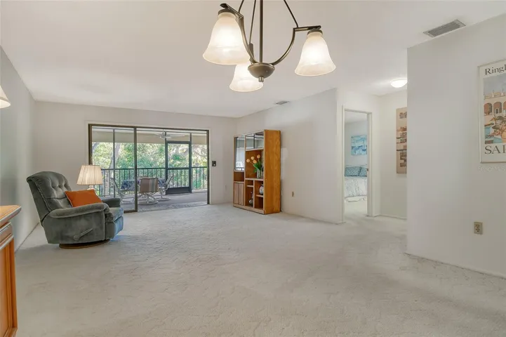 Living Room with Sliders to screened patio