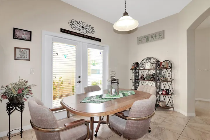 the nook has French doors to the courtyard
