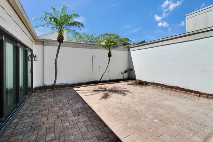 Outdoor Patio w/Brick pavers & Privacy wall