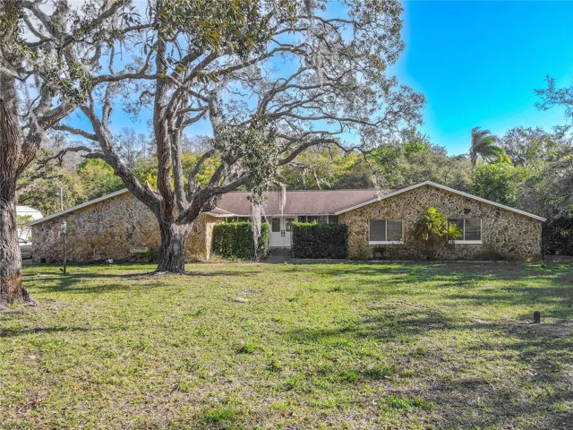 4 bedroom, 3-full Bath, Pool, Detached Garage with Workbench, on 1.27 Acres.