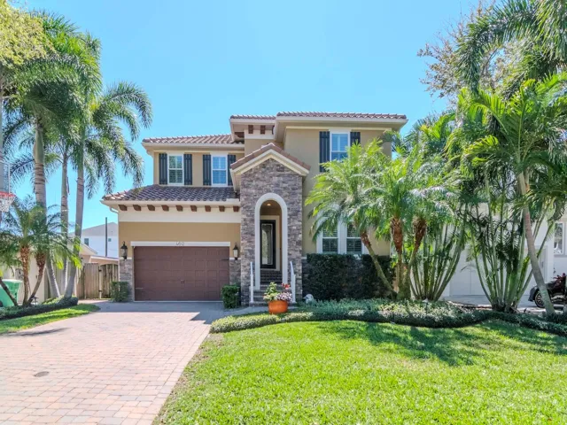 4612 W Lowell Ave  Beautifully landscaped for that tropical Florida feel. Stone façade, covered entry, barrel tile roof, 2 car garage and stone pavers.  Mediterranean-Styled Pool Home in S. Tampa, FL.