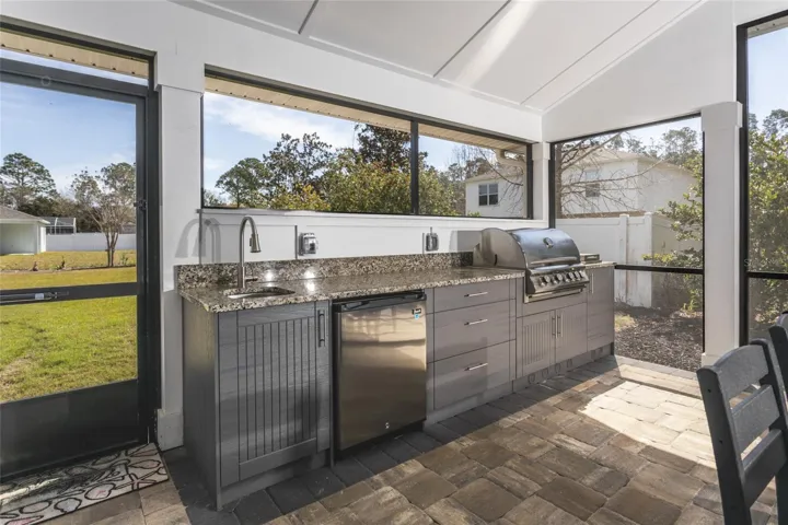 Brand new addition of outdoor kitchen.