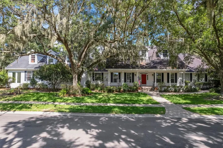 Nestled beneath the towering oak trees of Christina . . .