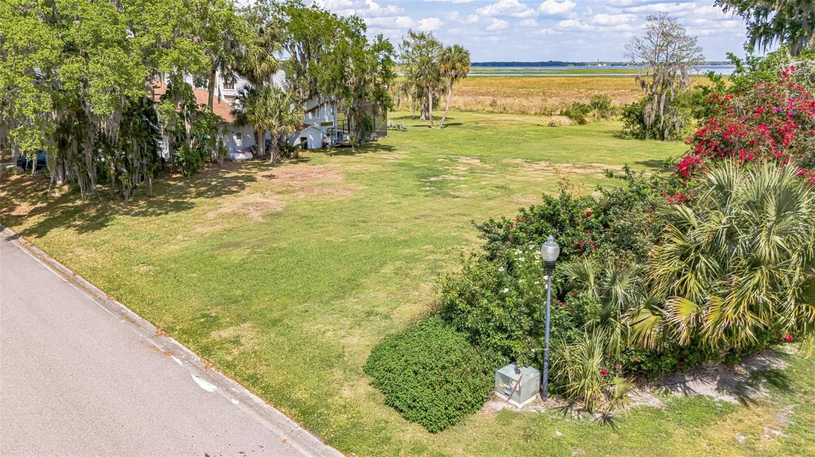 VIEW OF THE VACANT LOT ON HIDDEN HARBOR LANE