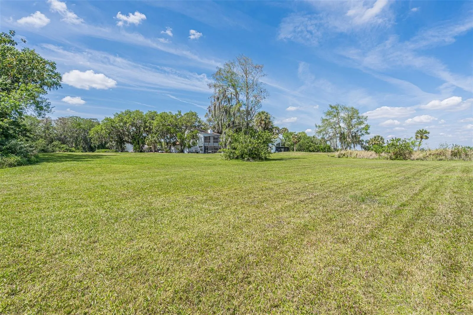 VIEW OF THE VACANT LOT ON HIDDEN HARBOR LANE