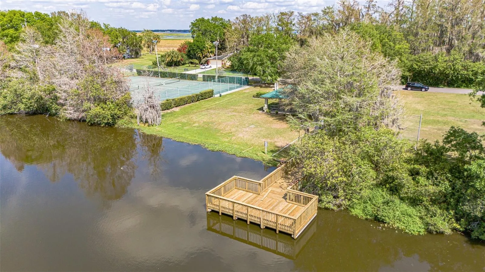ACROSS THE STREET FROM THE LAKEFRONT LOT * HIDDEN HARBOR AMENITIES - TENNIS COURTS, BASEBALL DIAMOND, BASKETBALL COURTS, GAZEBO AND FISHING PIER