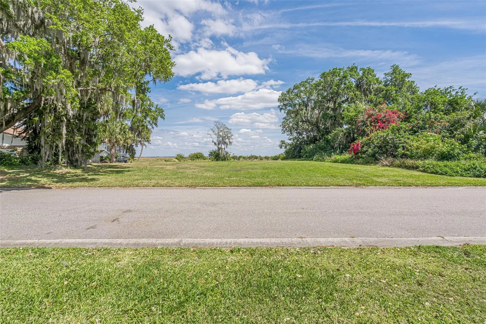 VIEW OF THE VACANT LOT ON HIDDEN HARBOR LANE