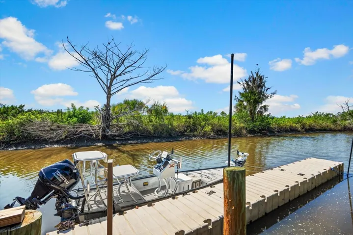 wood and floating permitted dock allows for direct access to ICW and fishing grounds on flats boat
