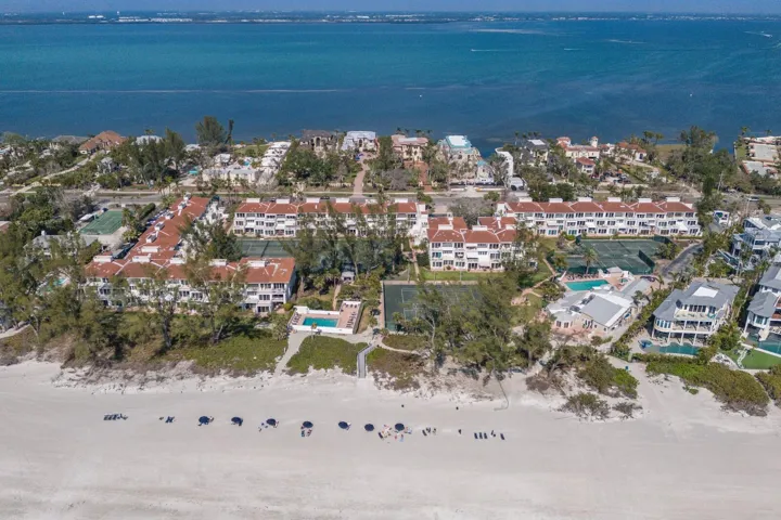 Club Longboat Private Beach Access With Chairs & Umbrellas