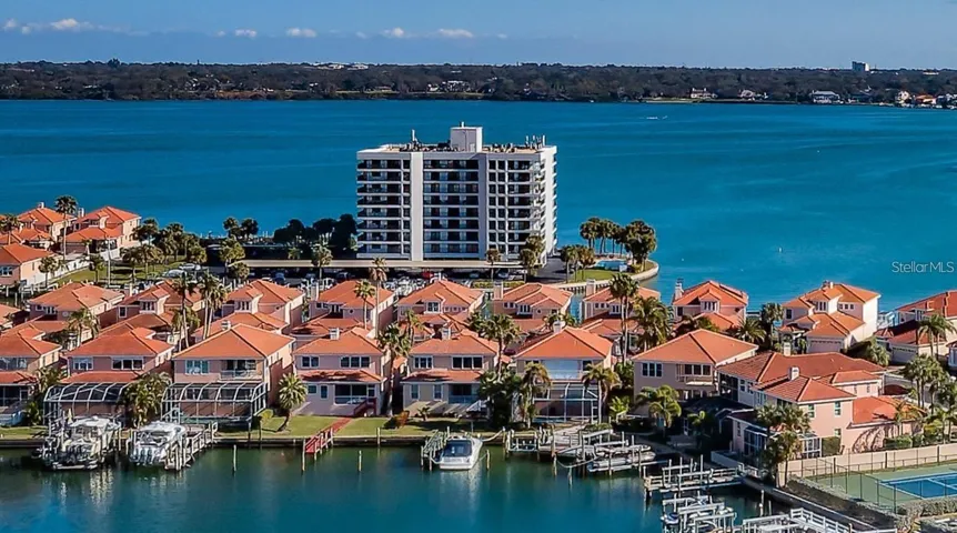 Presenting Gated Waterfront Harbourage II Community# 266 Ideally Situated on the Marina of Pristine Sand Key.  6th Floor Light & Bright Residence Offering the Warmth of Southern Exposure & Panorama of Intracoastal, Gulf & Marina Views Including Fabulous Nightly Sunsets.  Just a Short Stroll to Pristine Sand Key Beach.