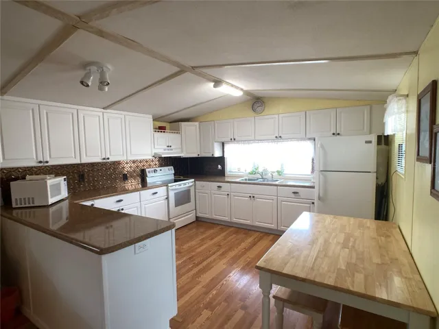 Wonderful large eat in kitchen bathed in natural light!