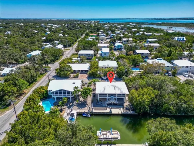 Aerial perspective showing the canal location within the Eden Pines neighborhood.