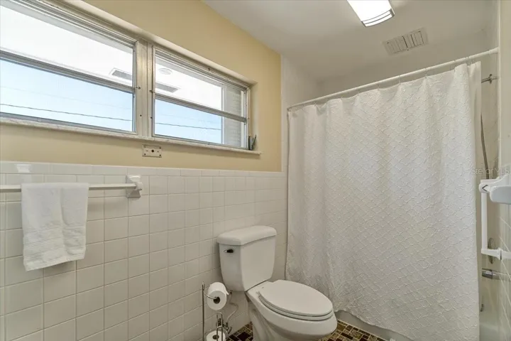 Primary bathroom serving the main bedroom.