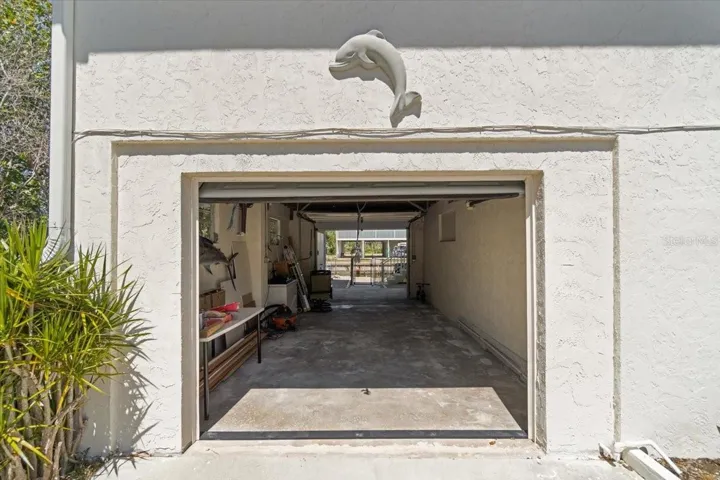 Garage with access from both ends for convenient storage.