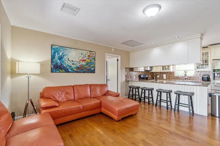 Comfortable living area with natural light and easy access to outdoor spaces.