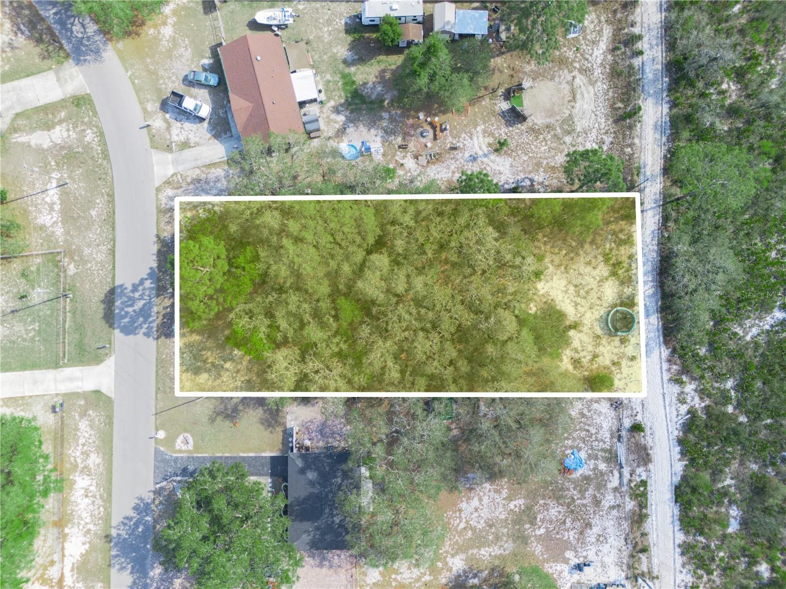 1/2 Acre Lot on Paved Road