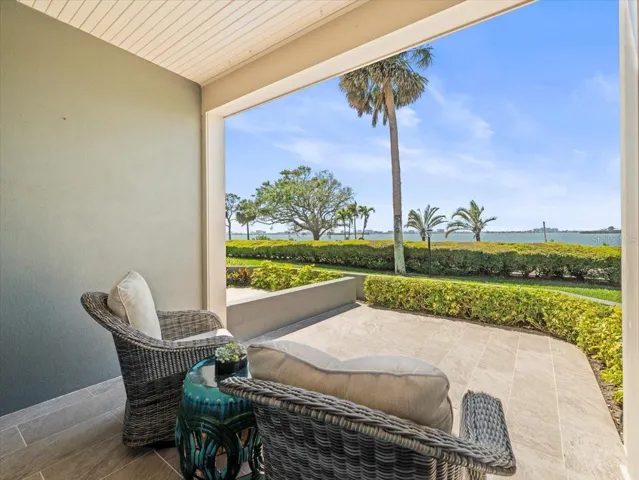 Private covered lanai and open waterfront patio