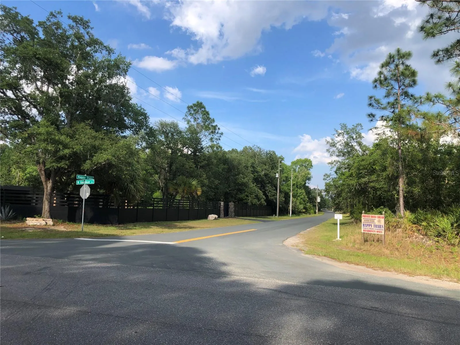 N Goodman and Happy Trails Entrance.