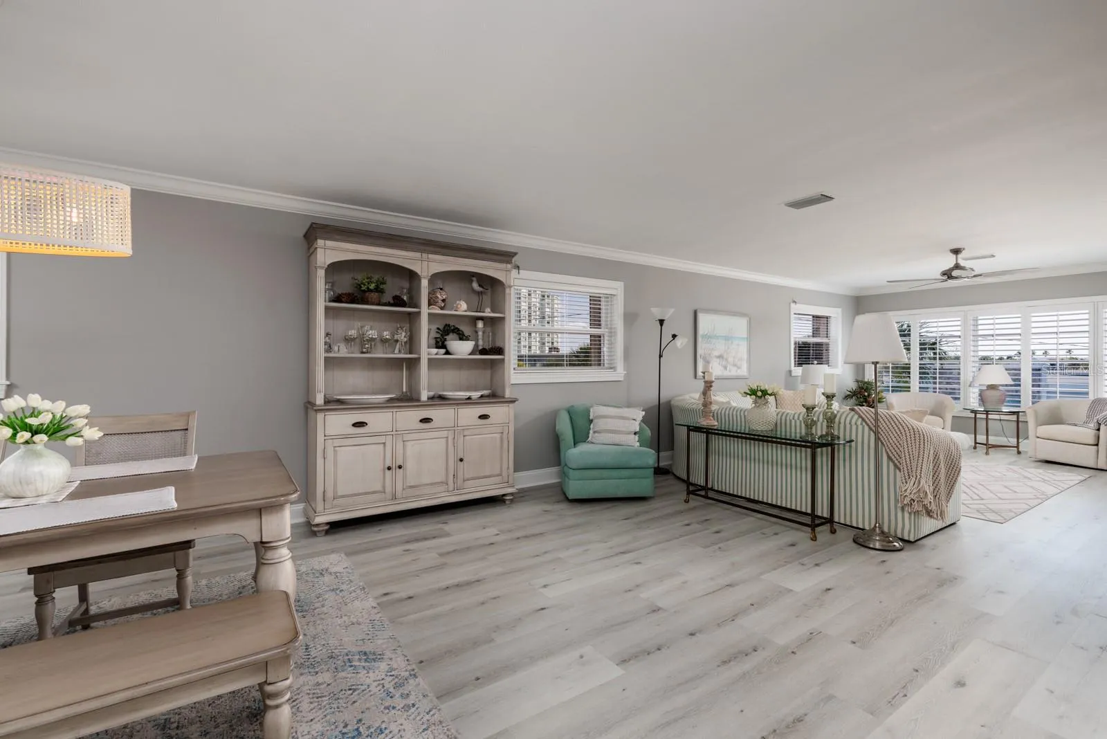 Dining/Living room areas. 3 side windows &amp; large living room window. All windows have hurricane shutters.