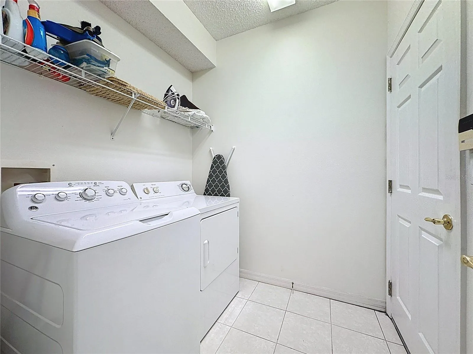 Laundry room - washer &amp; dryer remain
