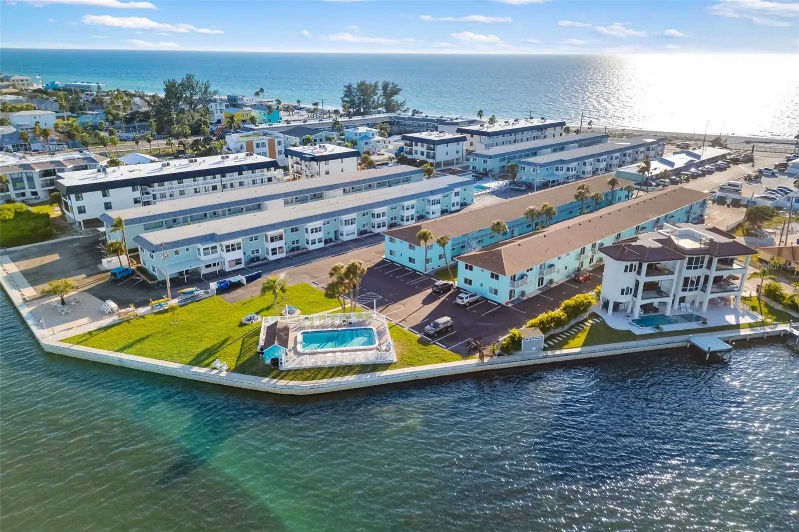 Aerial view showcasing prime island location between the Gulf of America and Sarasota Bay.