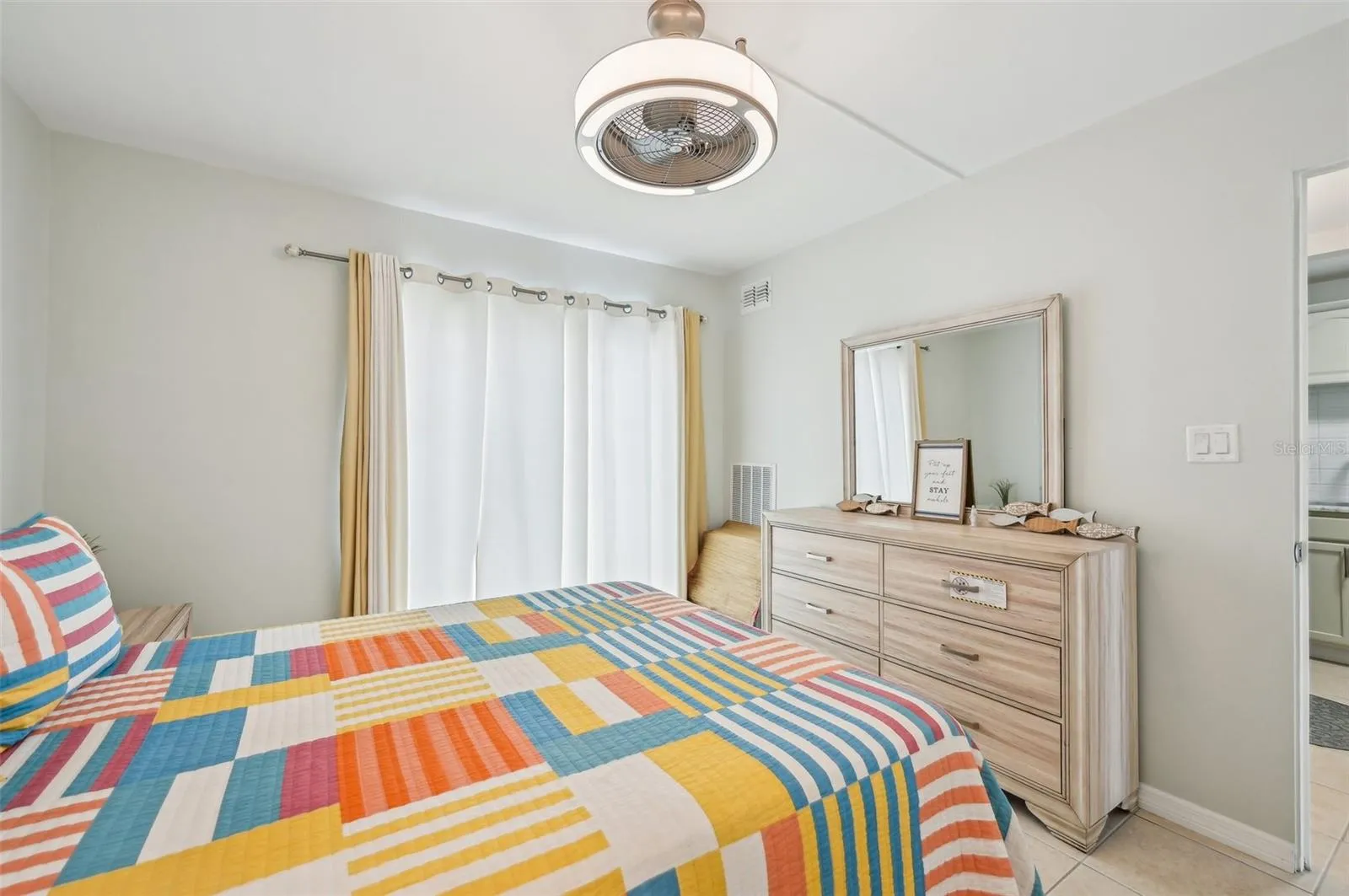 Bedroom offering functional space and storage