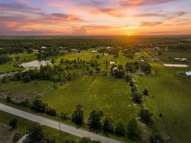 Wide open 9.36 acre lot in the country ready for you to call home