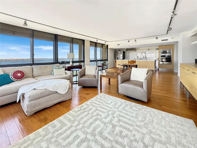 Living room open to dining and kitchen