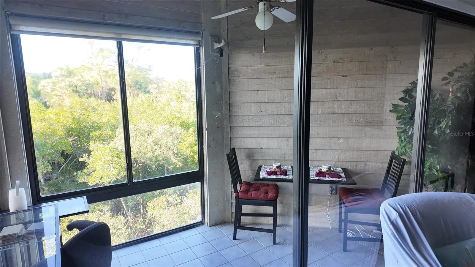 Lanai can be opened to central AC/Heat and has views of the mangroves, Gulf of Mexico and Sunset Beach.... Howard Beach in the background.
